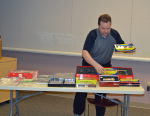 Bill Sandstrom showing "What's New at the Hobby Shop"
