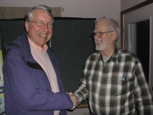First-timer Cave Forsythe (left) is welcomed by Olympia host Ted Eggleston.