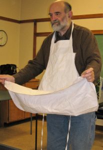 Ted models a jeweler’s apron…a cook’s apron with magnets sewn into the corners. Small parts fall into the apron not the floor.